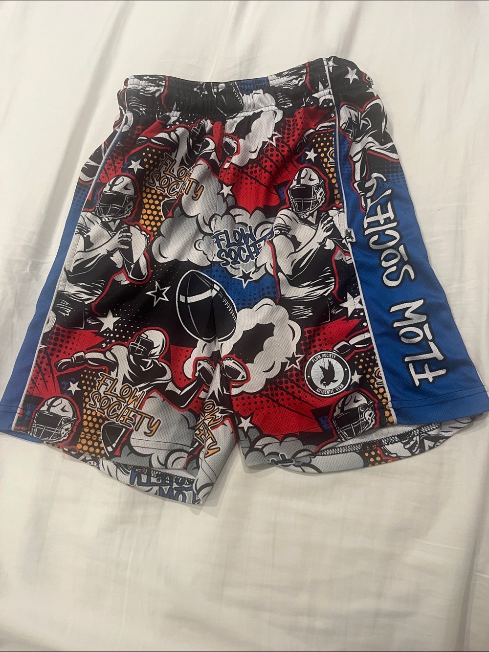Flow society football shorts size youth medium size